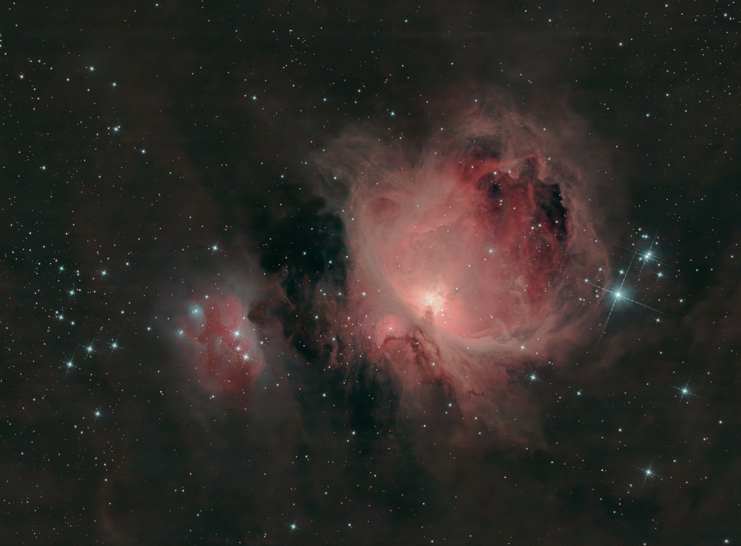 The Orion Nebula is an emission nebula in the constellation of Orion. Due to the brightness of its center, the nebula is readily visible to the unaided eye as part of Orion's Sword, south of the three stars of Orion's Belt.